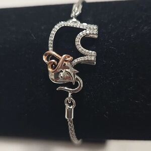 Diamonds, Silver, and 14k Gold Elephant Bracelet